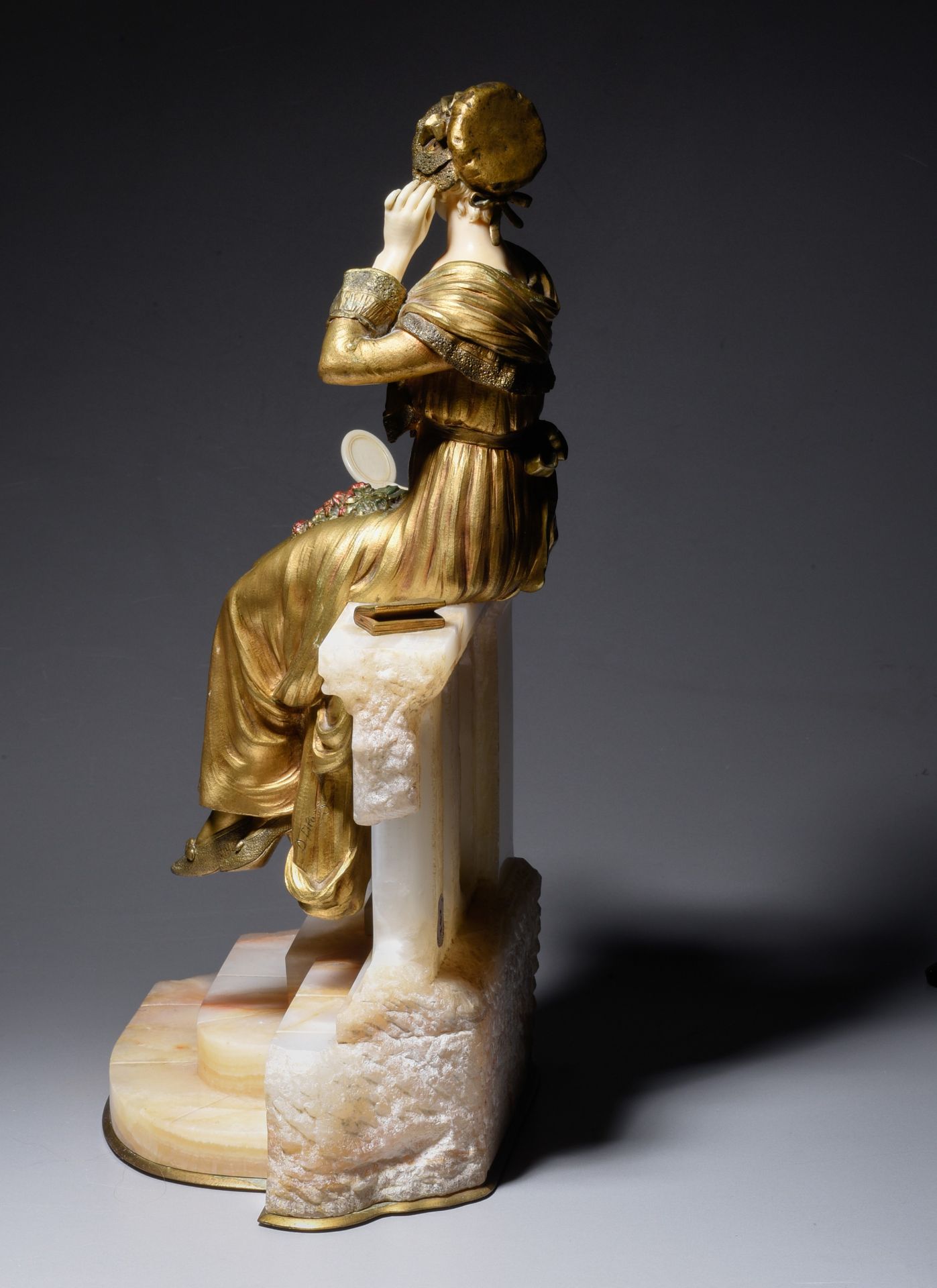 A chryselephantine, polychrome gilded bronze and ivory, H 40,5 cm (incl. base) (+) - Image 3 of 5