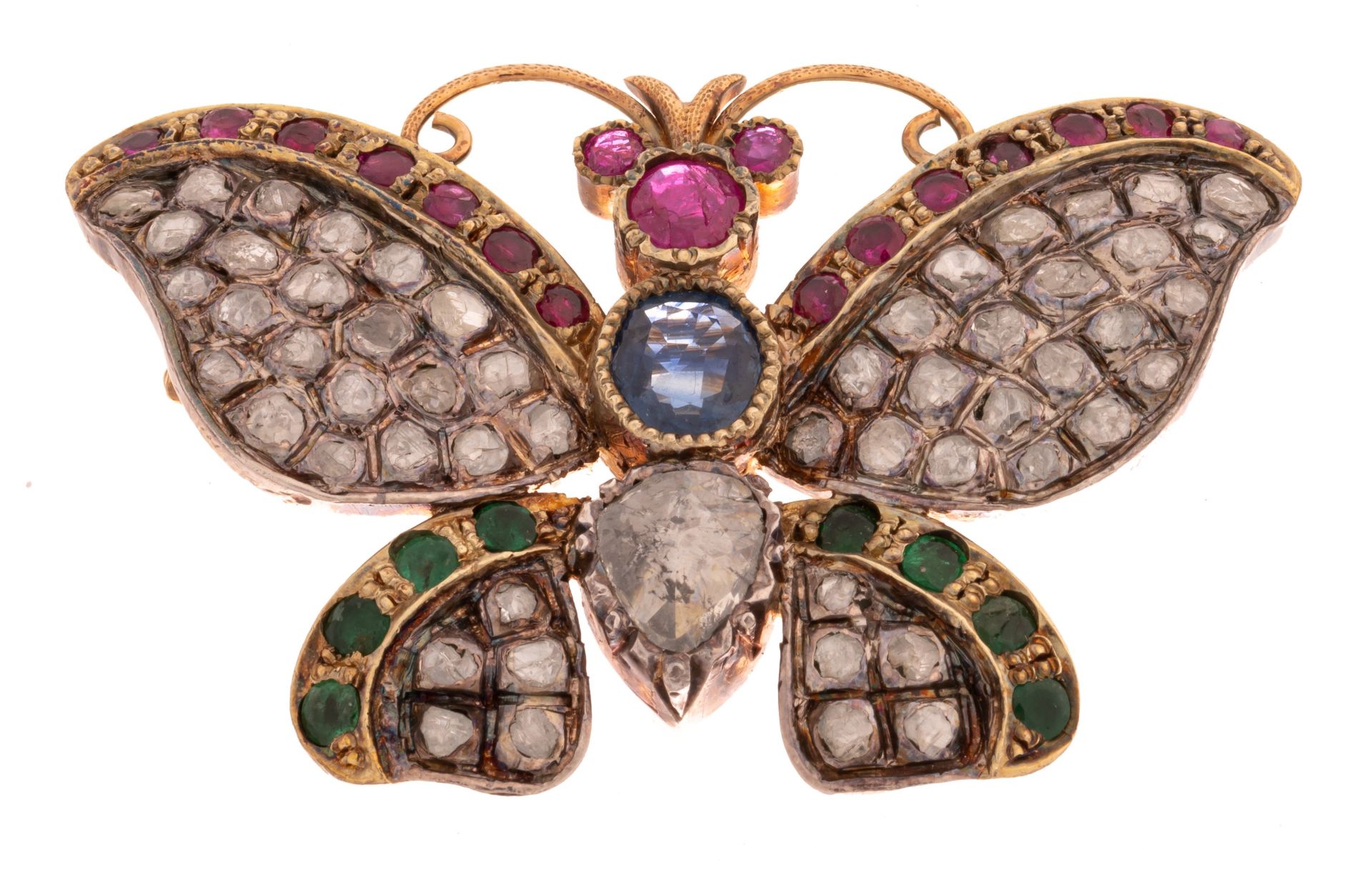 A butterfly-shaped brooch in 18ct yellow gold, set with diamonds, emeralds, rubies and sapphire, H 3