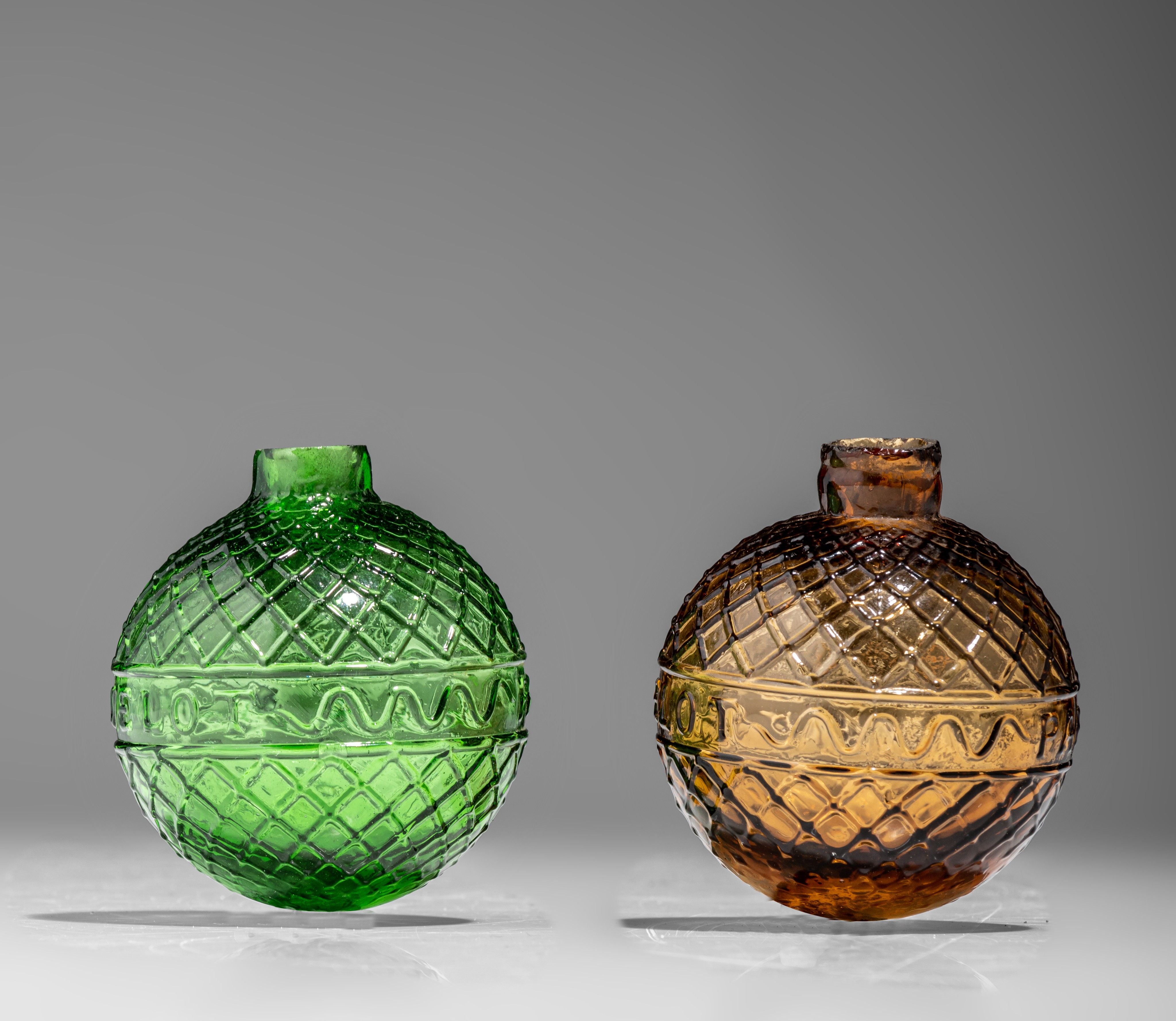 Two target balls, green and amber-coloured moulded glass, marked Gevelot - Paris, 1875-1900, H 7 cm - Image 7 of 9