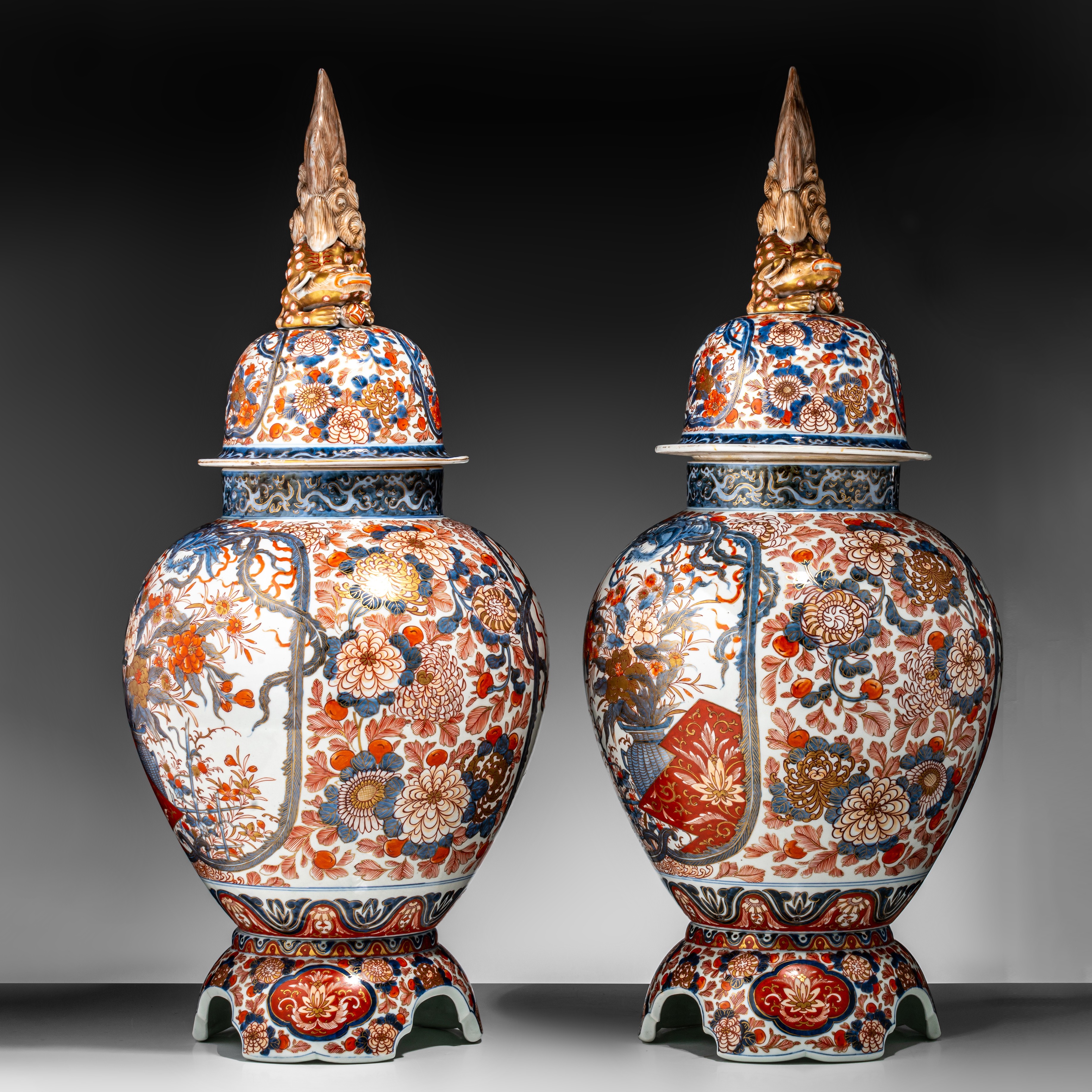 A pair of Japanese Imari covered vases, on a porcelain base, early Meiji, Total H 82,5 cm - Image 5 of 17