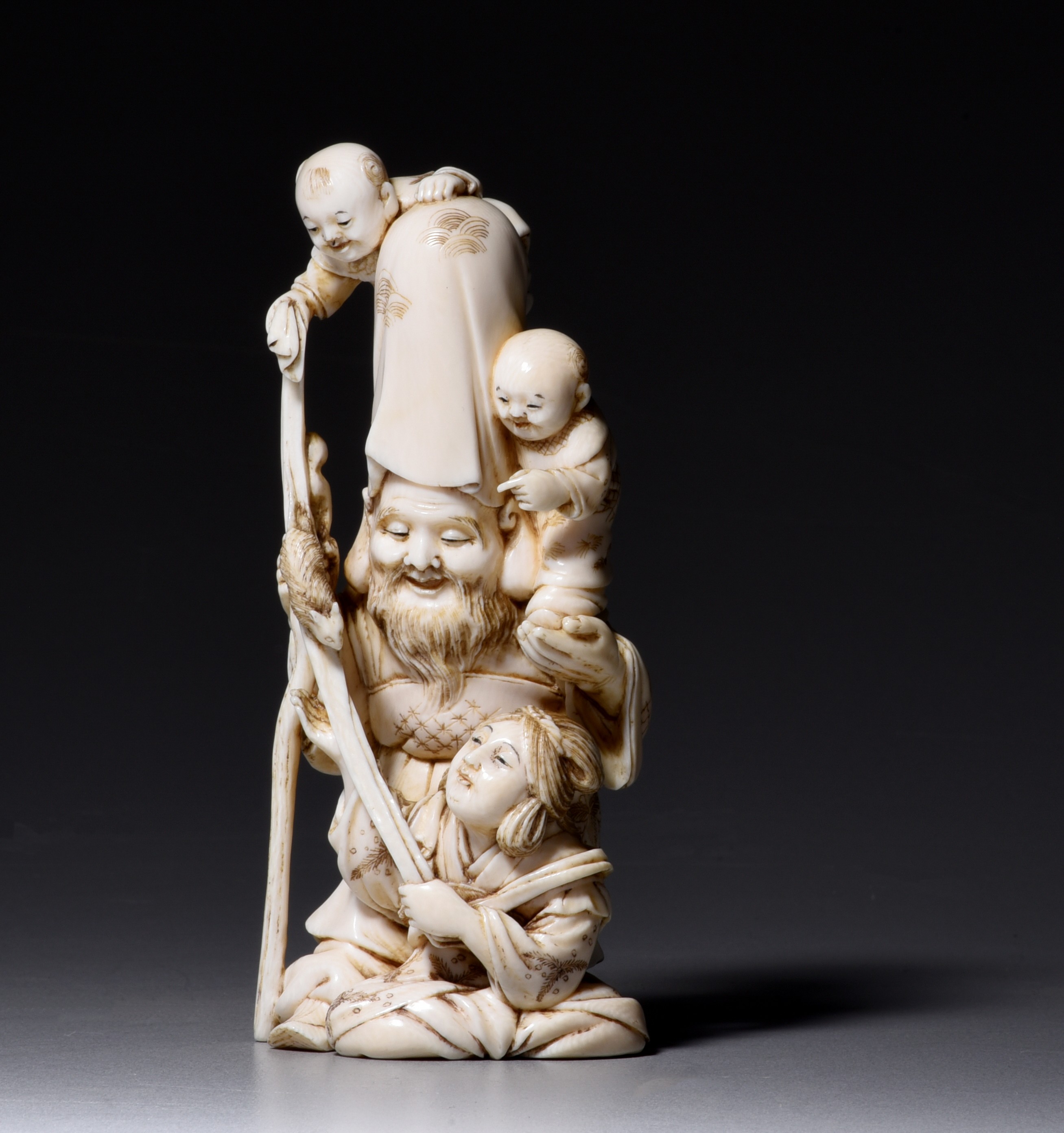 A Japanese ivory okimono of Fukurokuju, Edo/Meiji period, H 13 cm, 214 g (+)