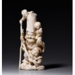 A Japanese ivory okimono of Fukurokuju, Edo/Meiji period, H 13 cm, 214 g (+)