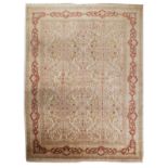 An Oriental silk on silk rug, floral decorated, signed, 201 x 301 cm