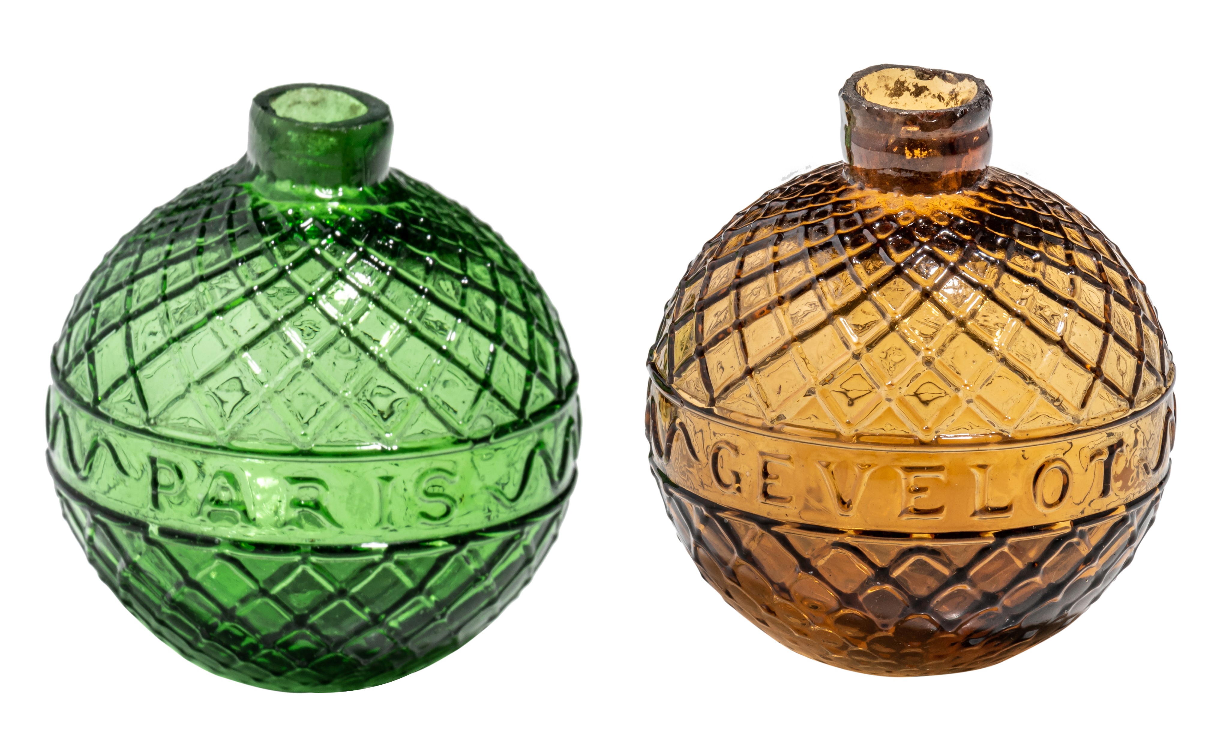 Two target balls, green and amber-coloured moulded glass, marked Gevelot - Paris, 1875-1900, H 7 cm