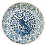 A Chinese Yuan-Ming style 'Phoenix in a garden' plate, ø 36,4 cm