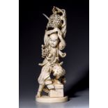 A Japanese ivory okimono depicting a warrior, late Edo/early Meiji period, H 23,8 cm, 532 g (+)