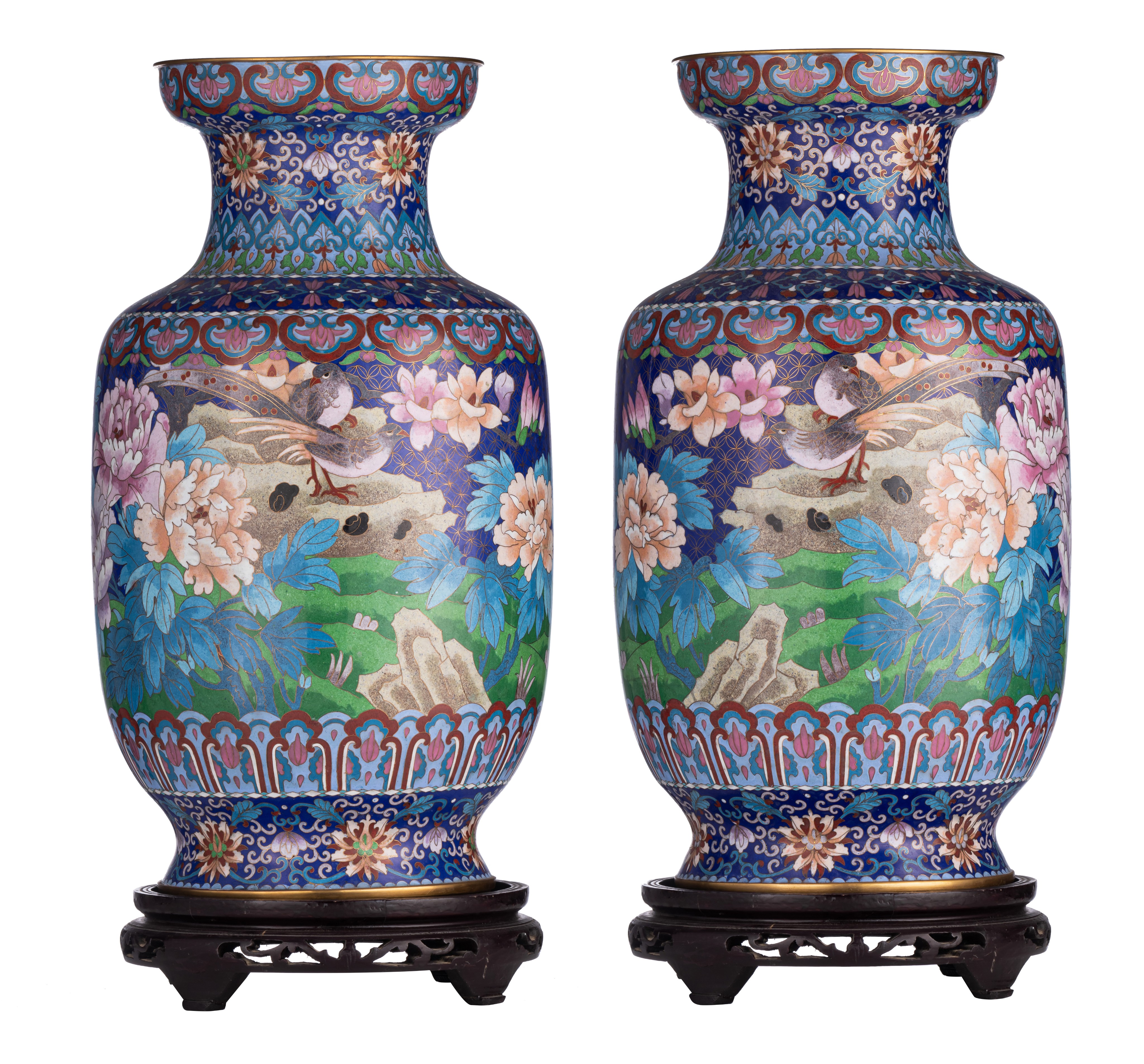 A pair of Chinese cloisonné enamelled 'Birds and peonies' bronze vases, 20thC, H 51,5 cm