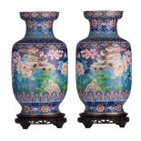 A pair of Chinese cloisonné enamelled 'Birds and peonies' bronze vases, 20thC, H 51,5 cm
