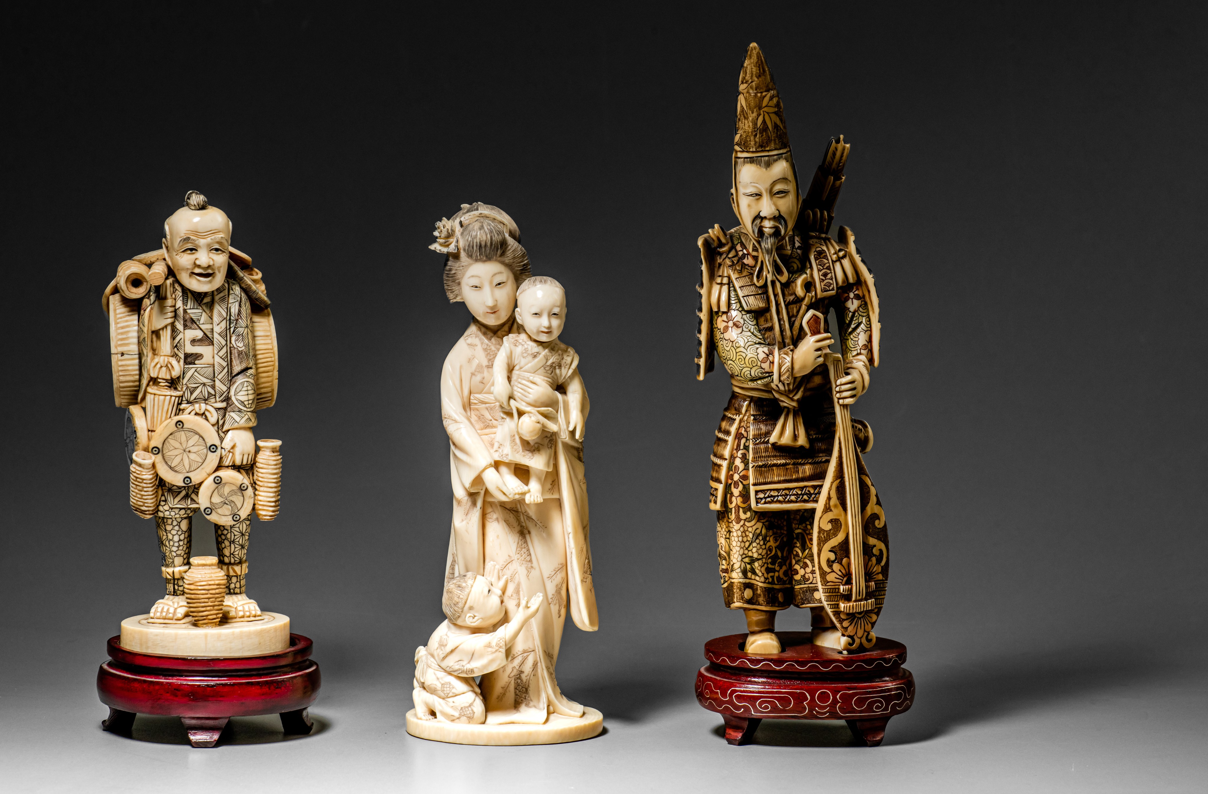 Three various Japanese carved ivory okimono (+)