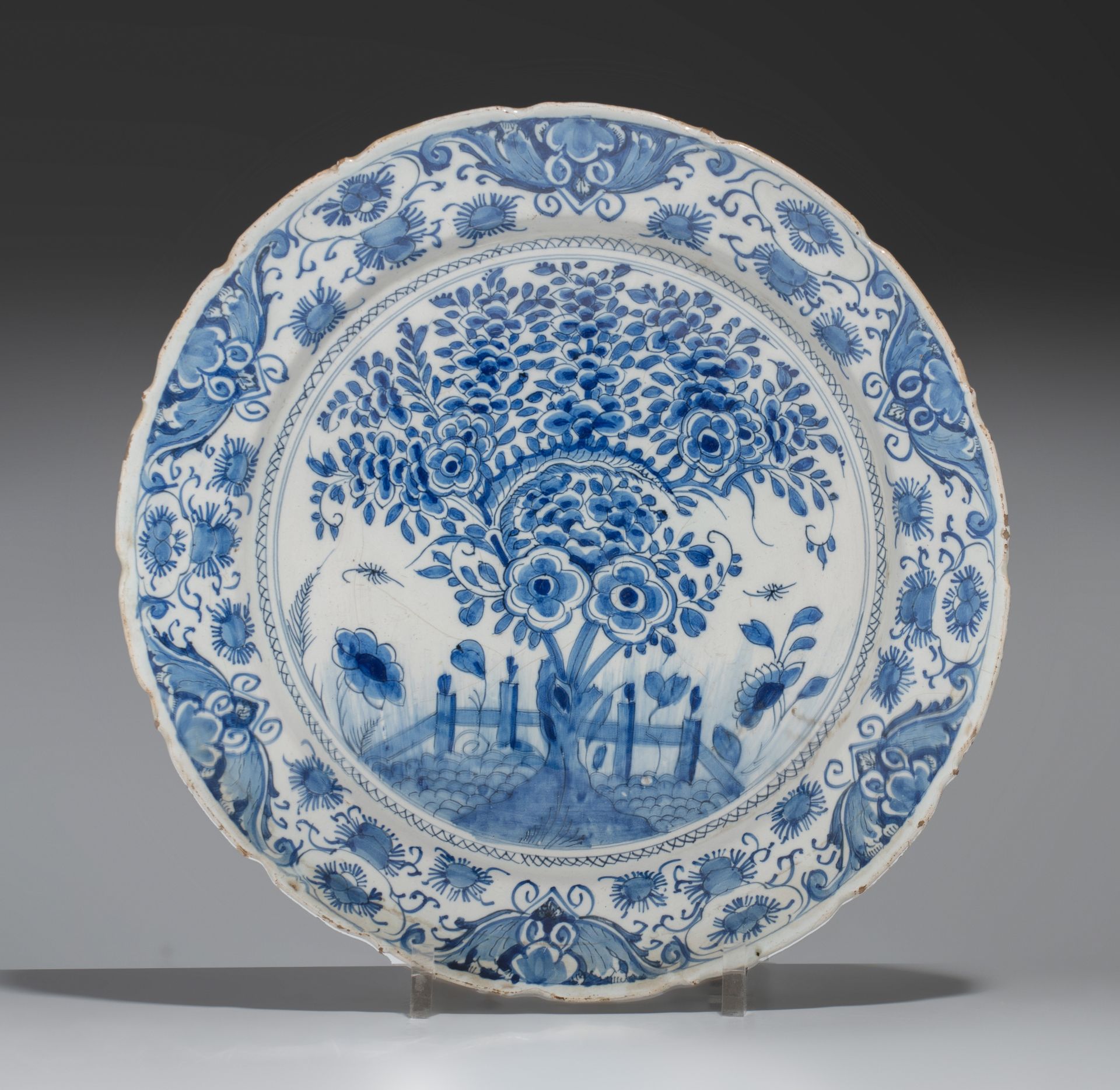 A pair of 18thC Delft plates by Geertruy Verstelle, added 12 blue and white plates, ø 16 - 34 cm - Image 2 of 17