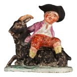 An 18thC charming Delft butter tub with a boy sitting on a goat, H 13,5 cm