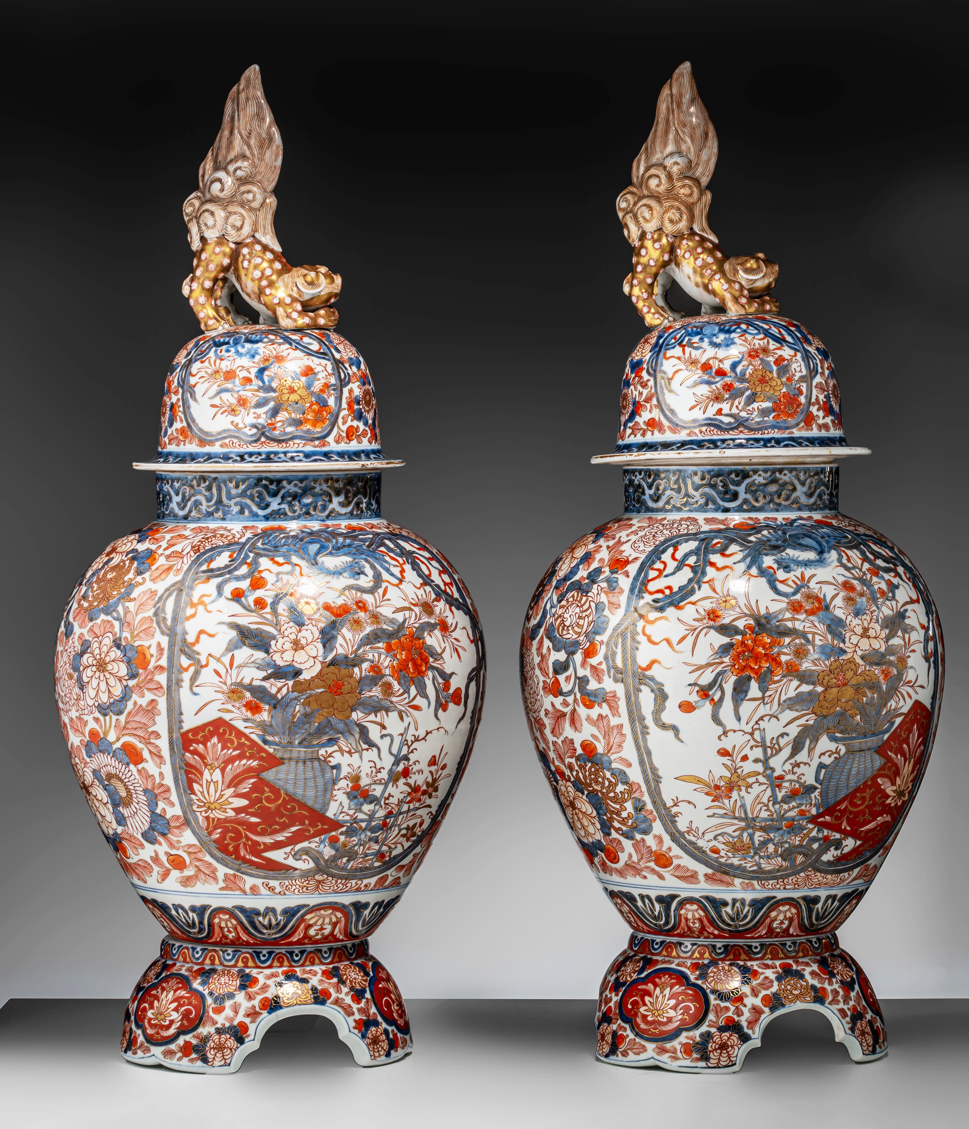 A pair of Japanese Imari covered vases, on a porcelain base, early Meiji, Total H 82,5 cm - Image 4 of 17