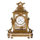 A Louis XVI style gilt bronze and Carrara marble mantle clock, H 48, 5 - W 35 cm