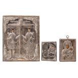 An Eastern European icon with silver oklad and two ditto travel icons, 19thC, 9 x 11 - 21 x 25,5 cm