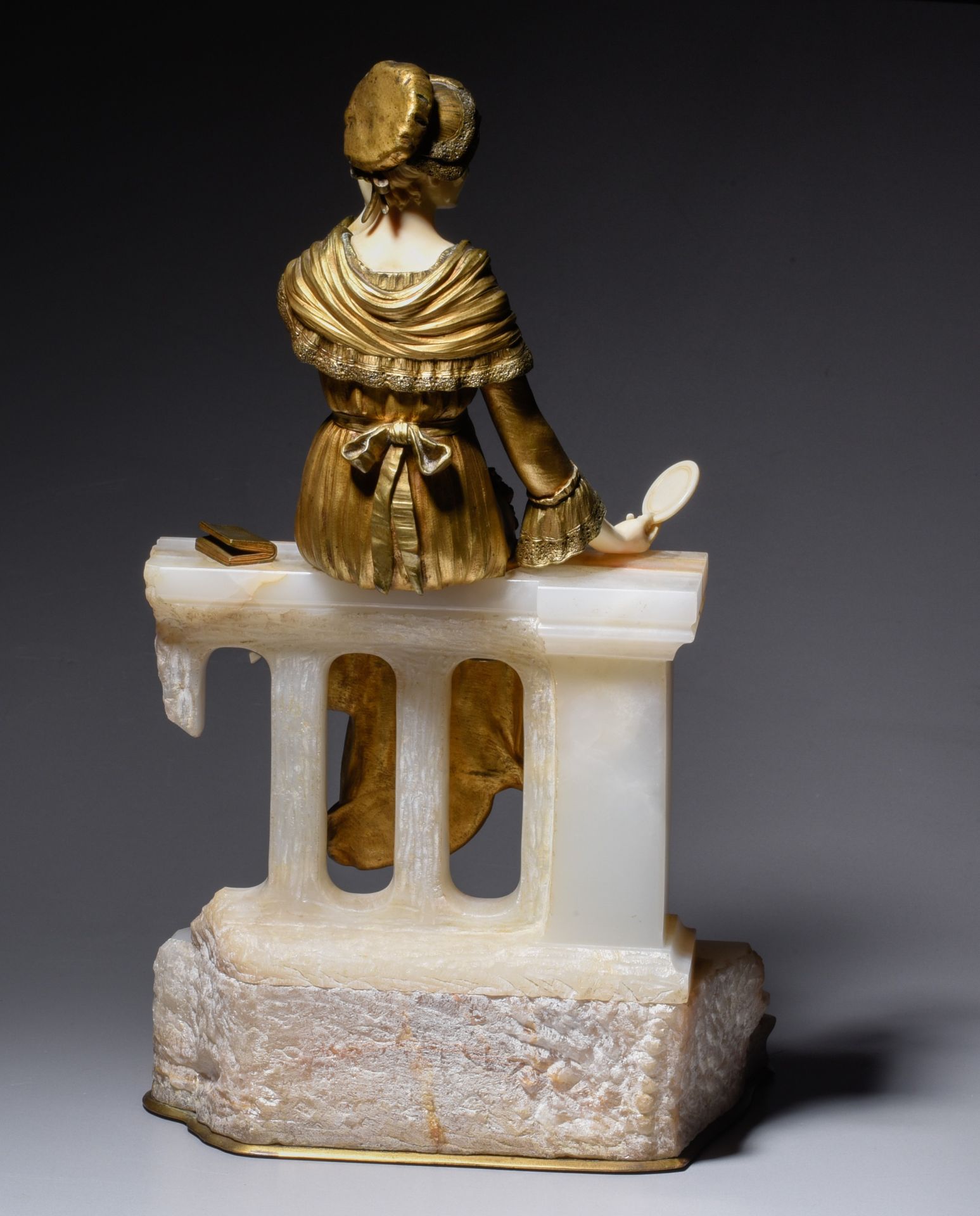 A chryselephantine, polychrome gilded bronze and ivory, H 40,5 cm (incl. base) (+) - Image 4 of 5