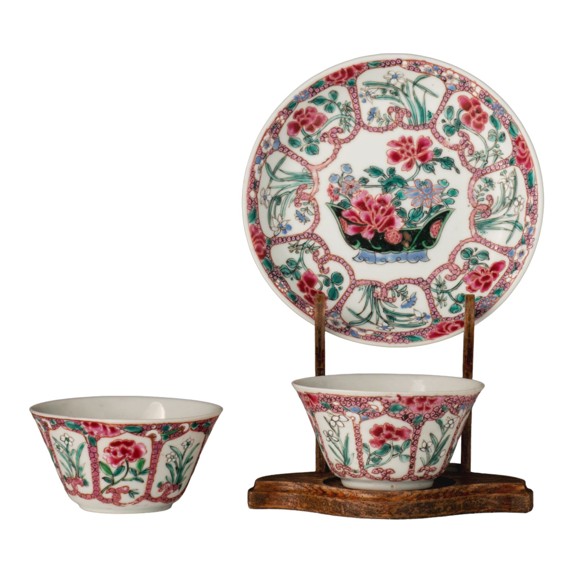 A set of Chinese famille rose and famille noire cup and saucer, and a second cup, 18thC, H 4 - ø 7 (