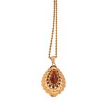 A braided 18ct yellow gold necklace, the pendant set with garnets, 19,7 g