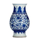A Chinese blue and white 'Scrolling Lotus' footed vase, H 30 cm