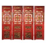 A South-Chinese four-fold gilt and red lacquered wood screen, late 19thC/20thC, 205 x 61 cm (each pa