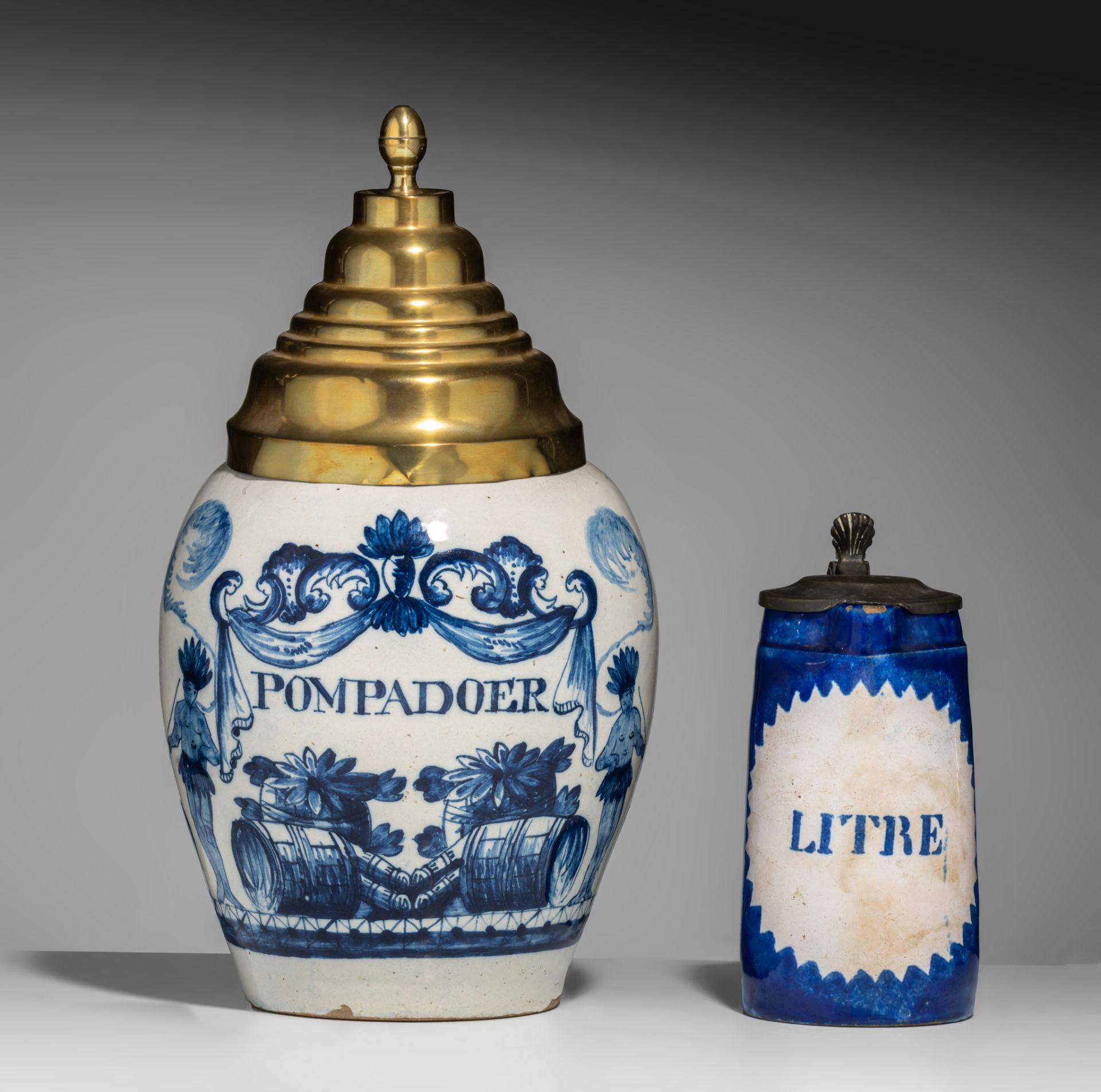 An 18thC Dutch Delft tobacco jar and an early 19thC Brussels one-litre jar, H 21,5 - 39 cm - Image 2 of 8