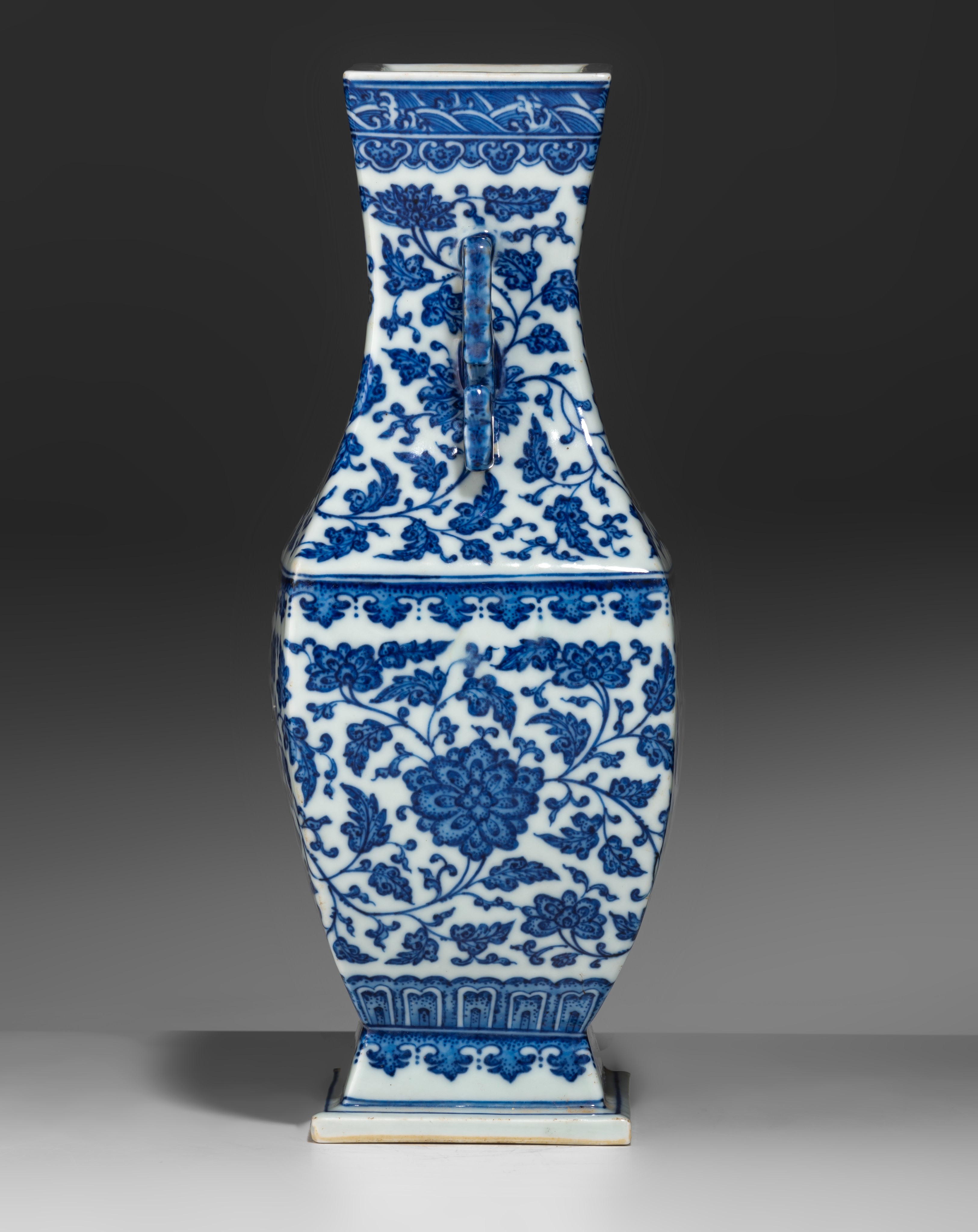 A Chinese blue and white 'Lotus scrolls' fanghu vase, paired with dragon handles, with a Qianlong ma - Image 6 of 9