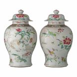 A pair of Chinese famille rose floral decorated covered vases, Yonghzeng period, H 42 cm