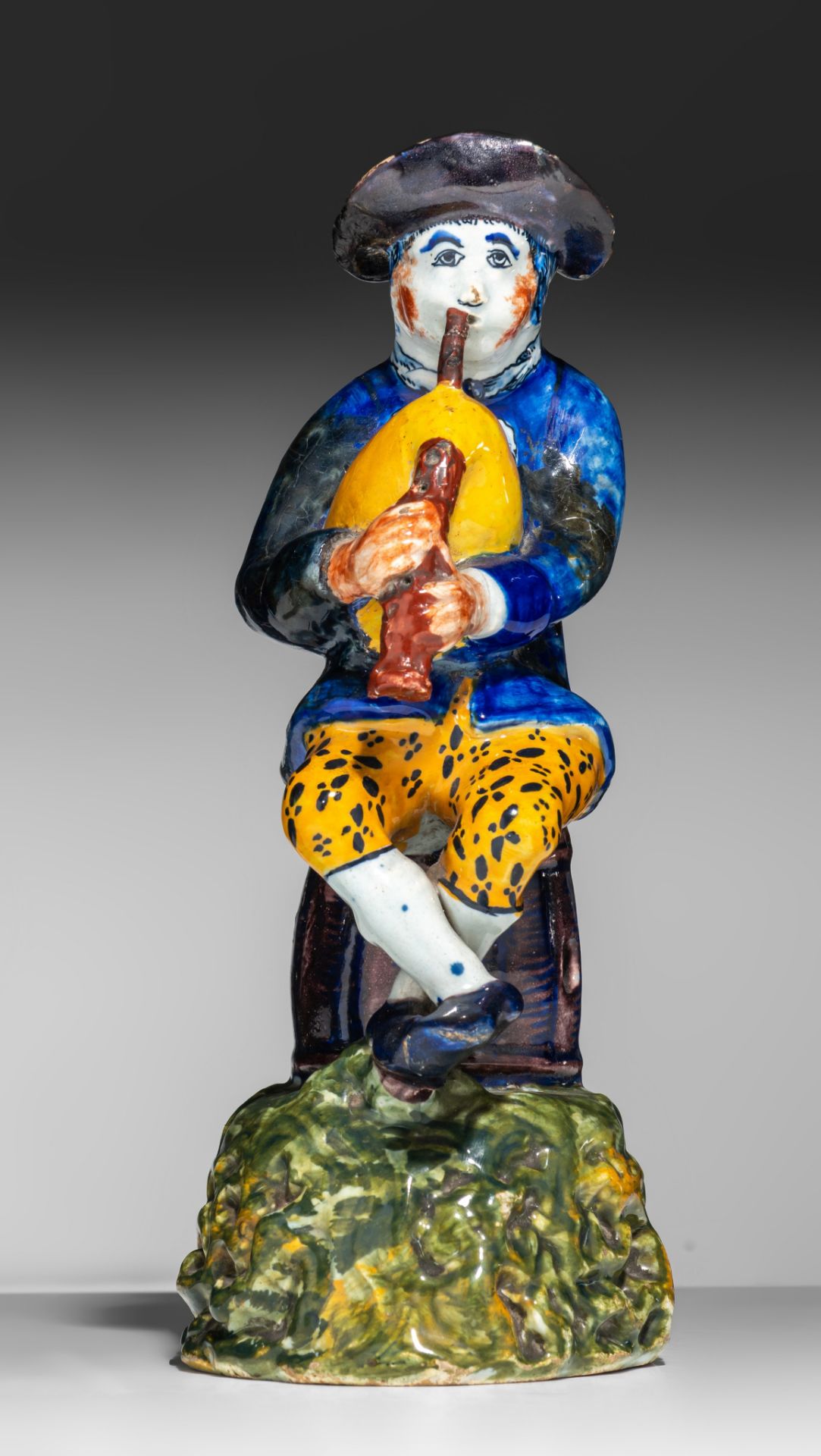 An 18thC Dutch Delft polychrome decorated figurine of a bagpiper, H 21 cm - Bild 3 aus 10