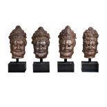 A complete series of four monumental Chinese ancient-style cast-iron statue heads of the "Four Heave