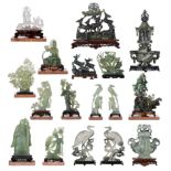 A collection of Chinese jadeite sculptures, 20thC, tallest H 36,5 cm