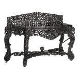 An Anglo-Indian very richly carved exotic hardwood console table, H 99 - W 150 - D 55 cm