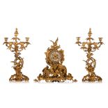 A Rococo Revival gilt bronze three-piece mantel clock set, H 48 - 58 cm