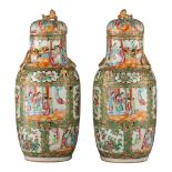 A pair of Chinese Canton lidded vases, 19thC, H 50 cm