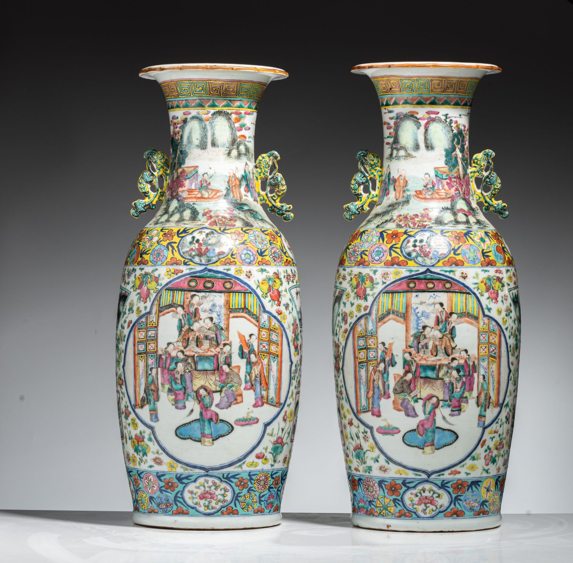 A pair of Chinese famille rose 'Court scene' vases, paired with lingzhi handles, 19thC, H 61 cm - Bild 2 aus 7