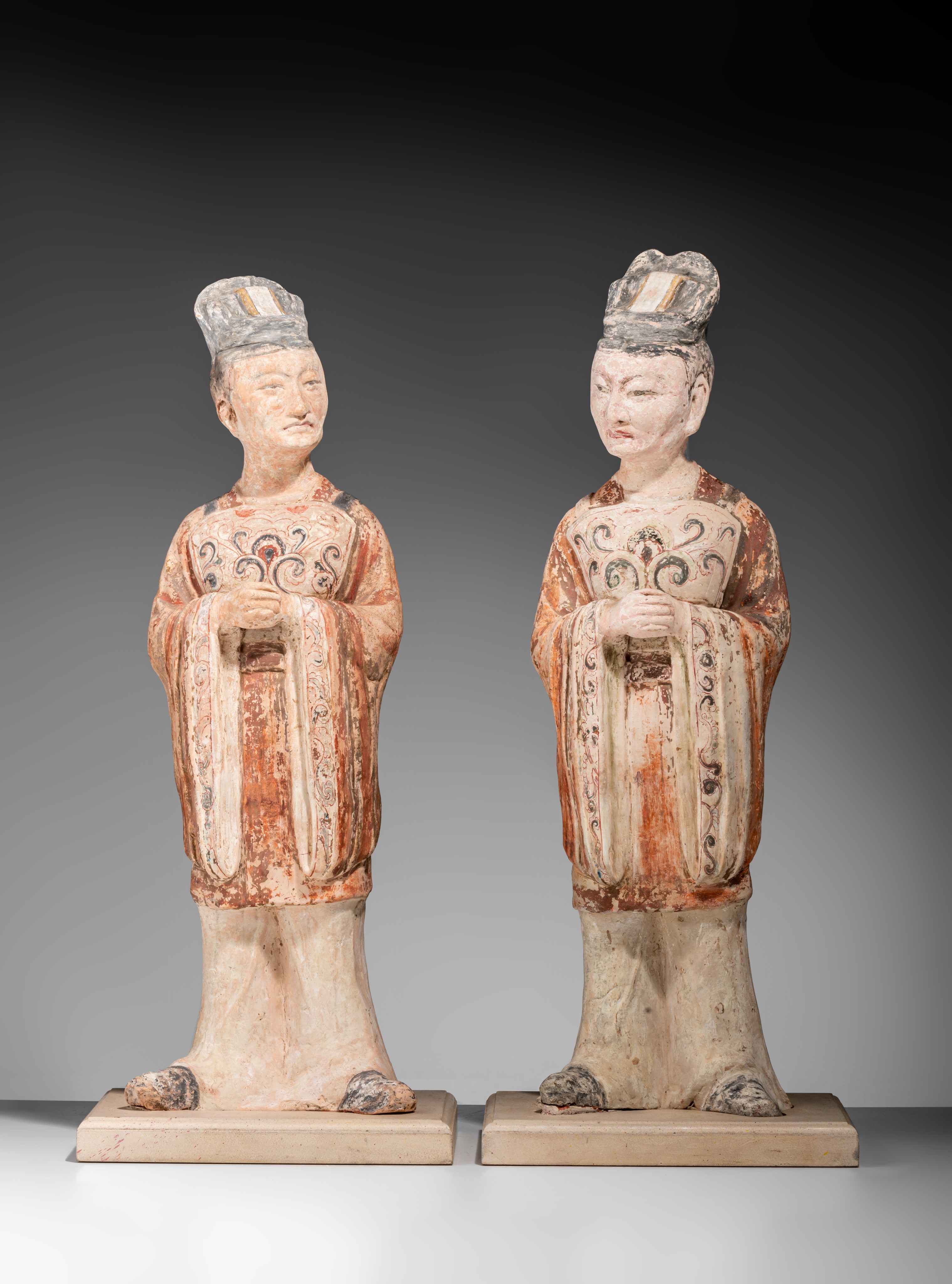 A series of two large Chinese painted pottery figures of officials, Tang dynasty, Total H 64,5 cm - Image 2 of 17