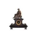 A Napoleon III marble mantle clock, with on top a patinated bronze female spinner, H 51 - W 44,5 cm