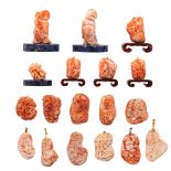 A collection of coral pendants and ornaments, late Qing/Republic, largest ø cm (18)