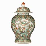 A Chinese famille verte covered vase, 19thC, H 44,5 cm