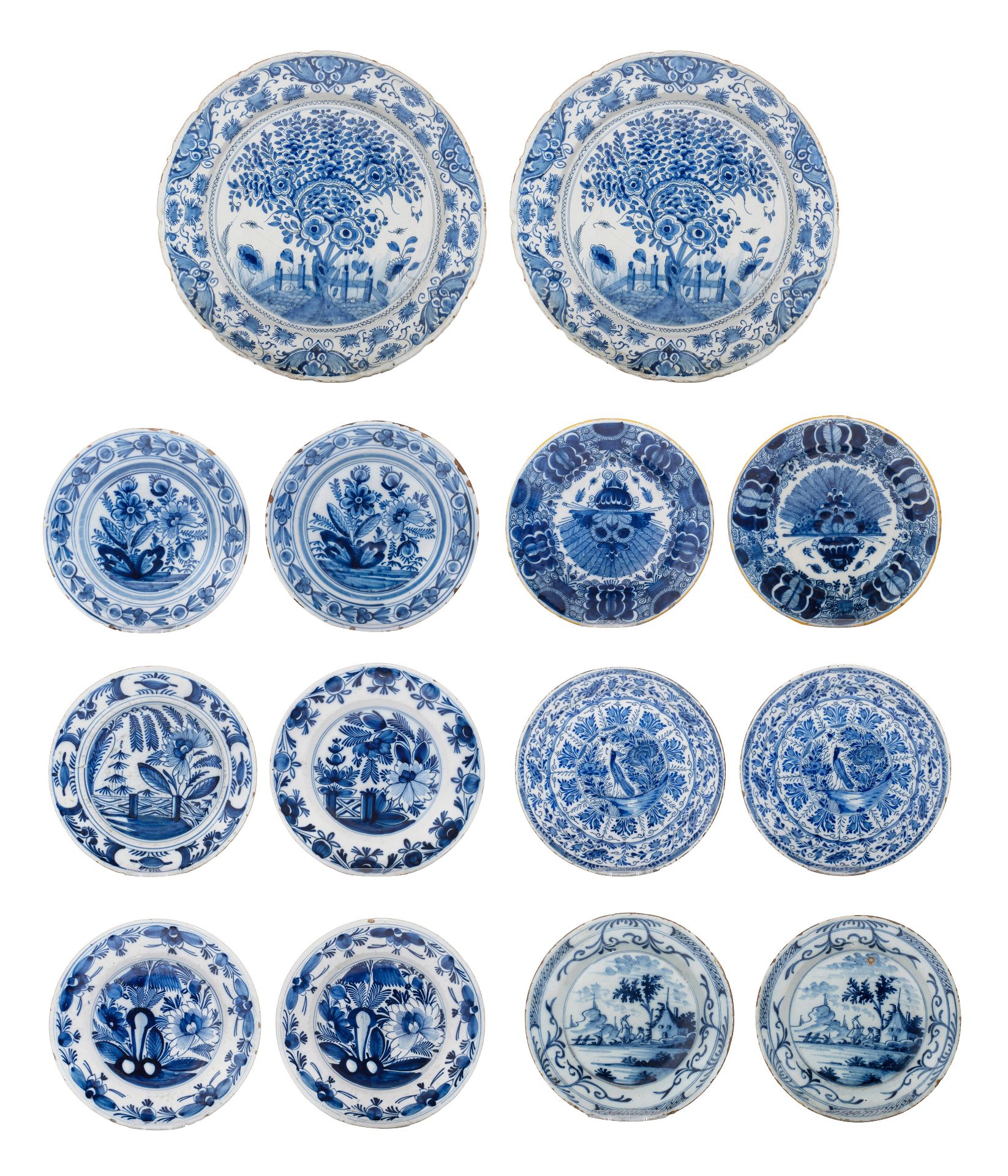 A pair of 18thC Delft plates by Geertruy Verstelle, added 12 blue and white plates, ø 16 - 34 cm