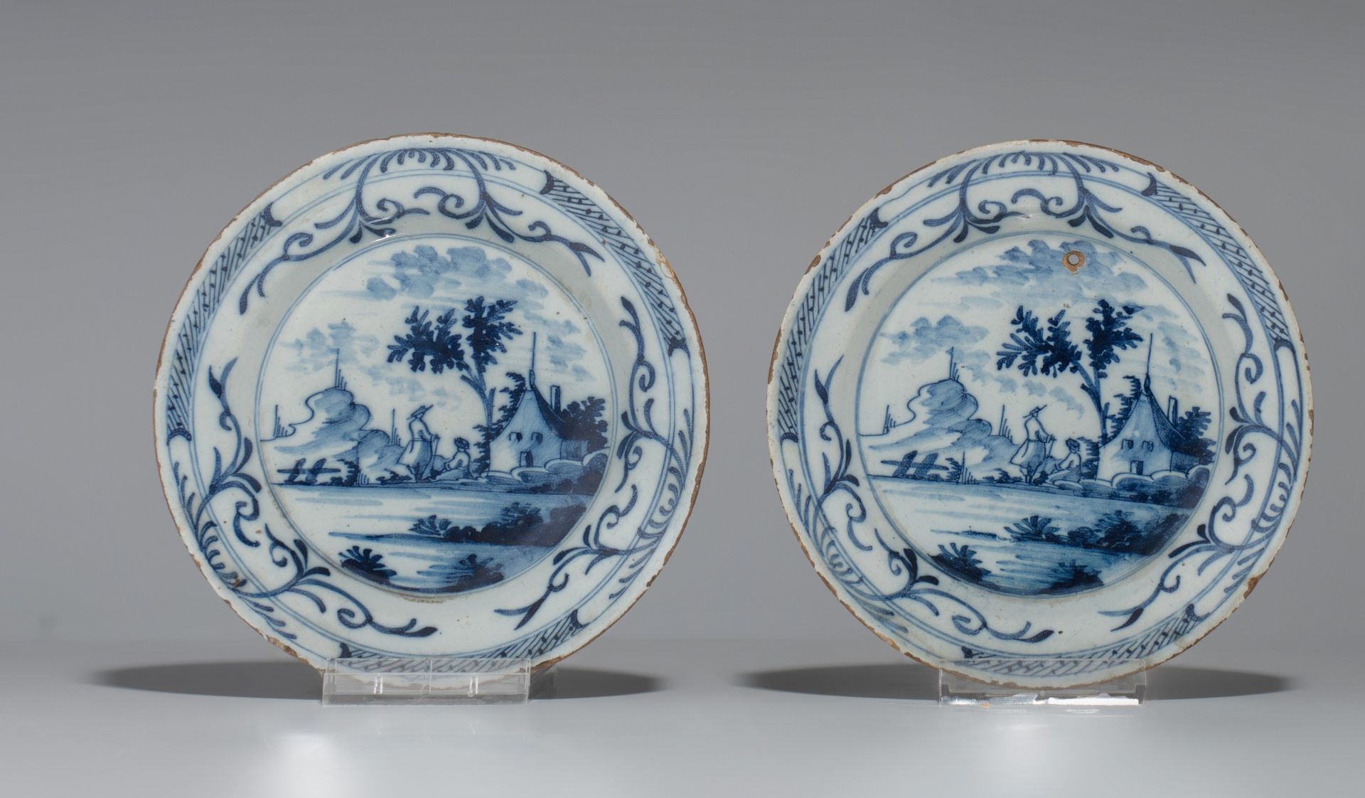 A pair of 18thC Delft plates by Geertruy Verstelle, added 12 blue and white plates, ø 16 - 34 cm - Image 16 of 17