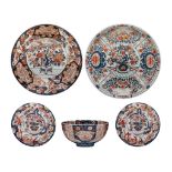 A collection of Japanese Imari ware, all decorated with a flower basket, Edo and Meiji period, large