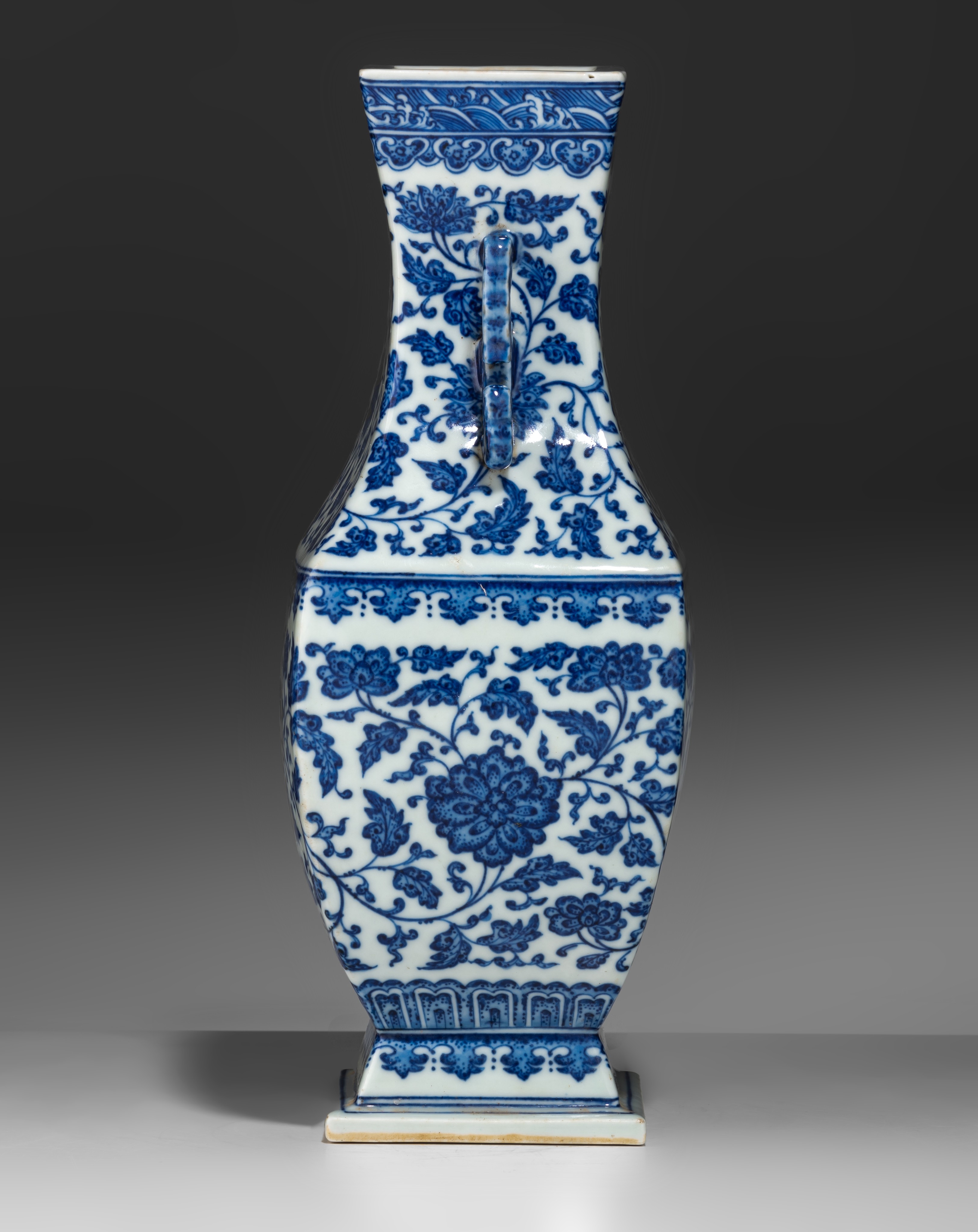 A Chinese blue and white 'Lotus scrolls' fanghu vase, paired with dragon handles, with a Qianlong ma - Image 4 of 9