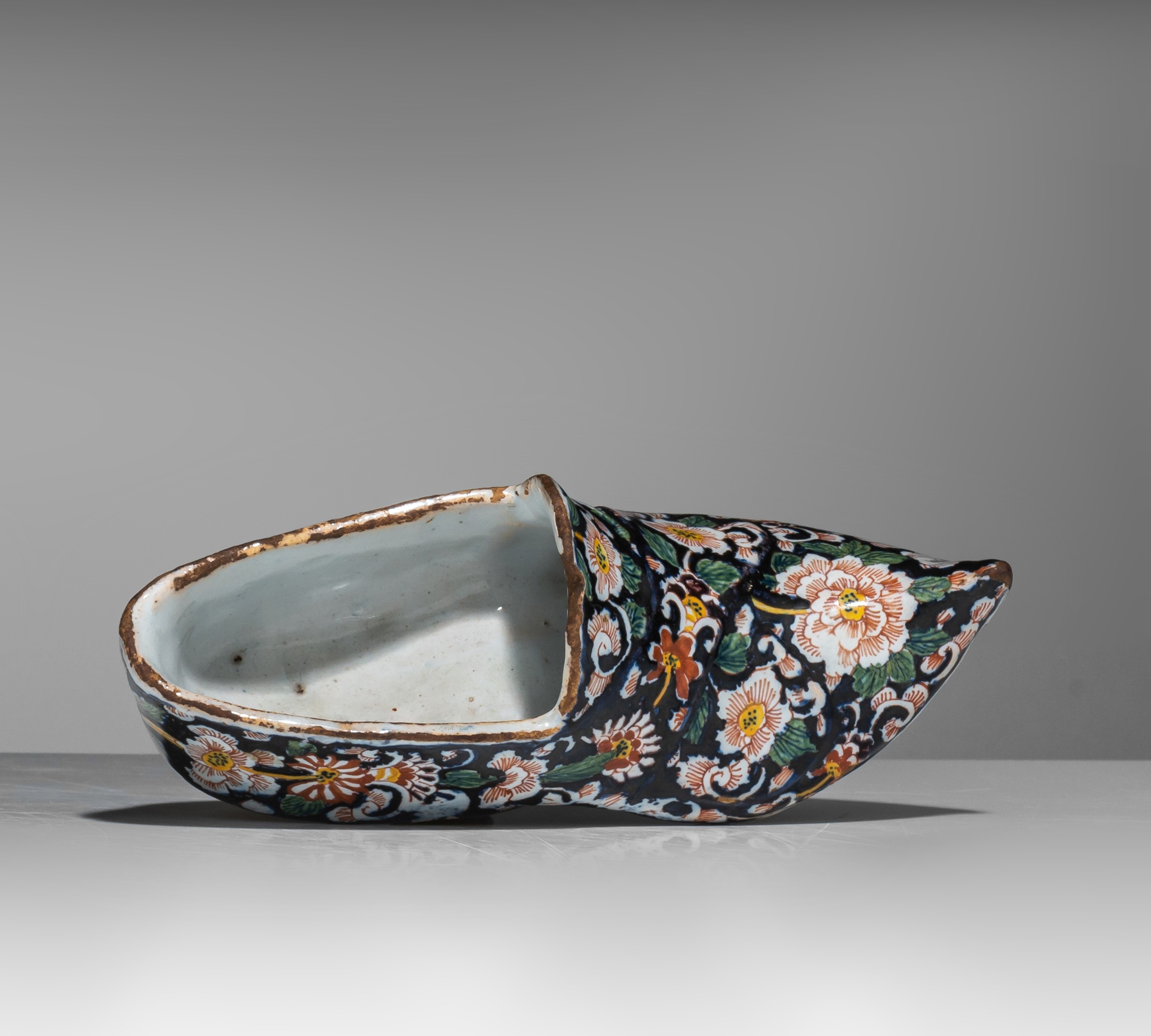 A rare 18thC black Dutch Delft miniature shoe, polychrome decorated, H 7 cm - Image 8 of 8