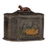 An interesting Oriental-style tea caddy in lead, moulded with figures, H 11,5 - 12,5 x 9 cm
