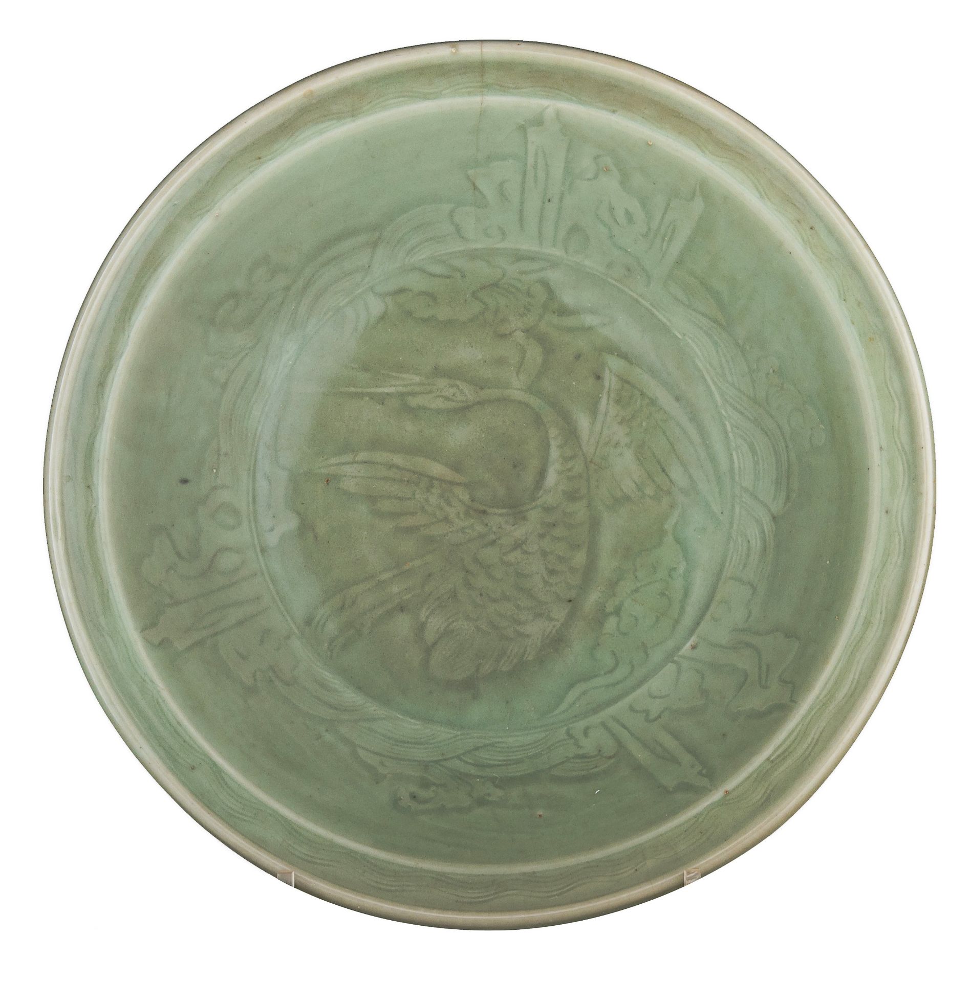 A Chinese carved Longquan celadon 'Crane' charger, Ming period, ø 37,5 cm