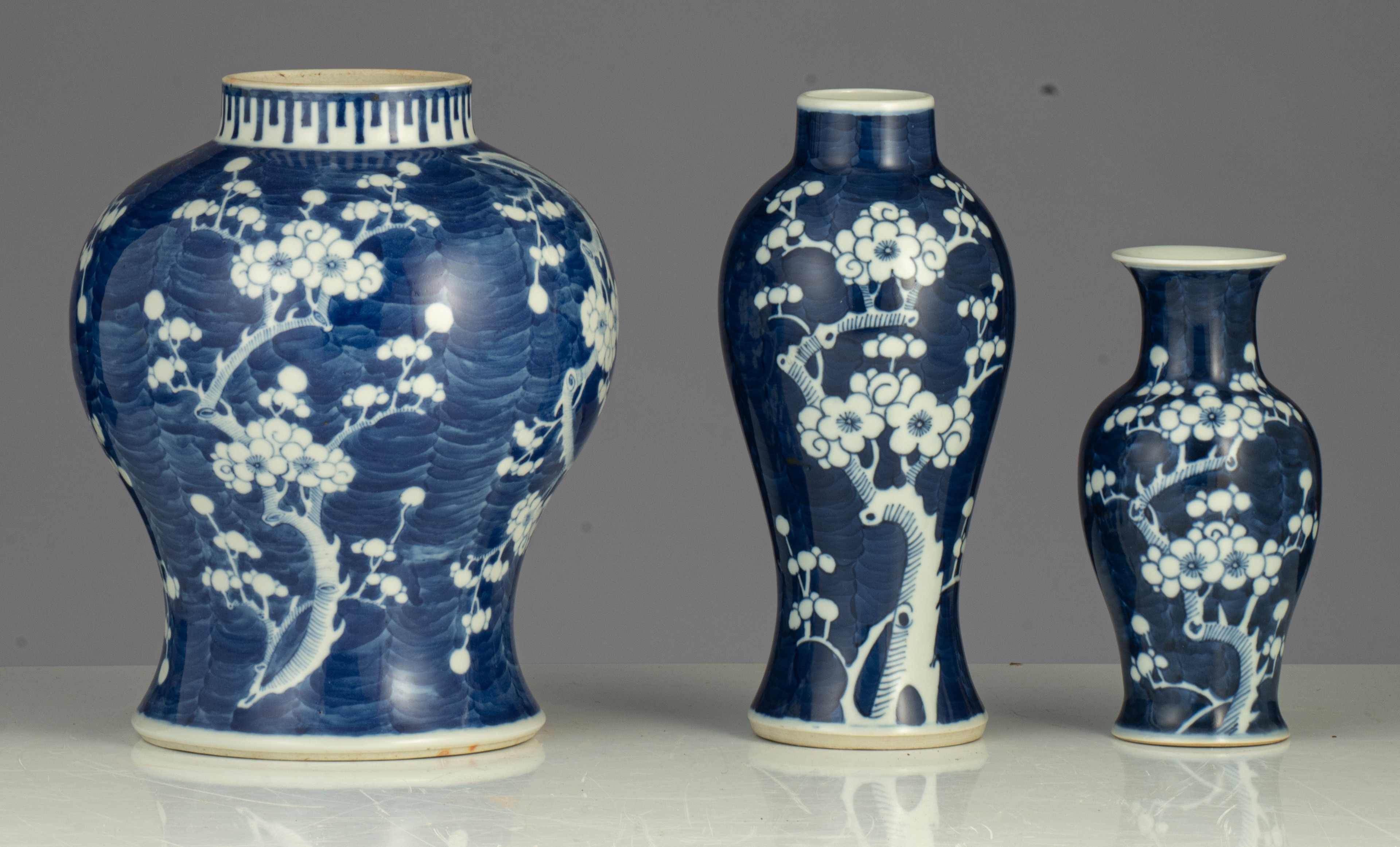 A collection of Chinese 'Prunus on cracked ice' pattern vases and jars, famille rose figures and pot - Image 19 of 37