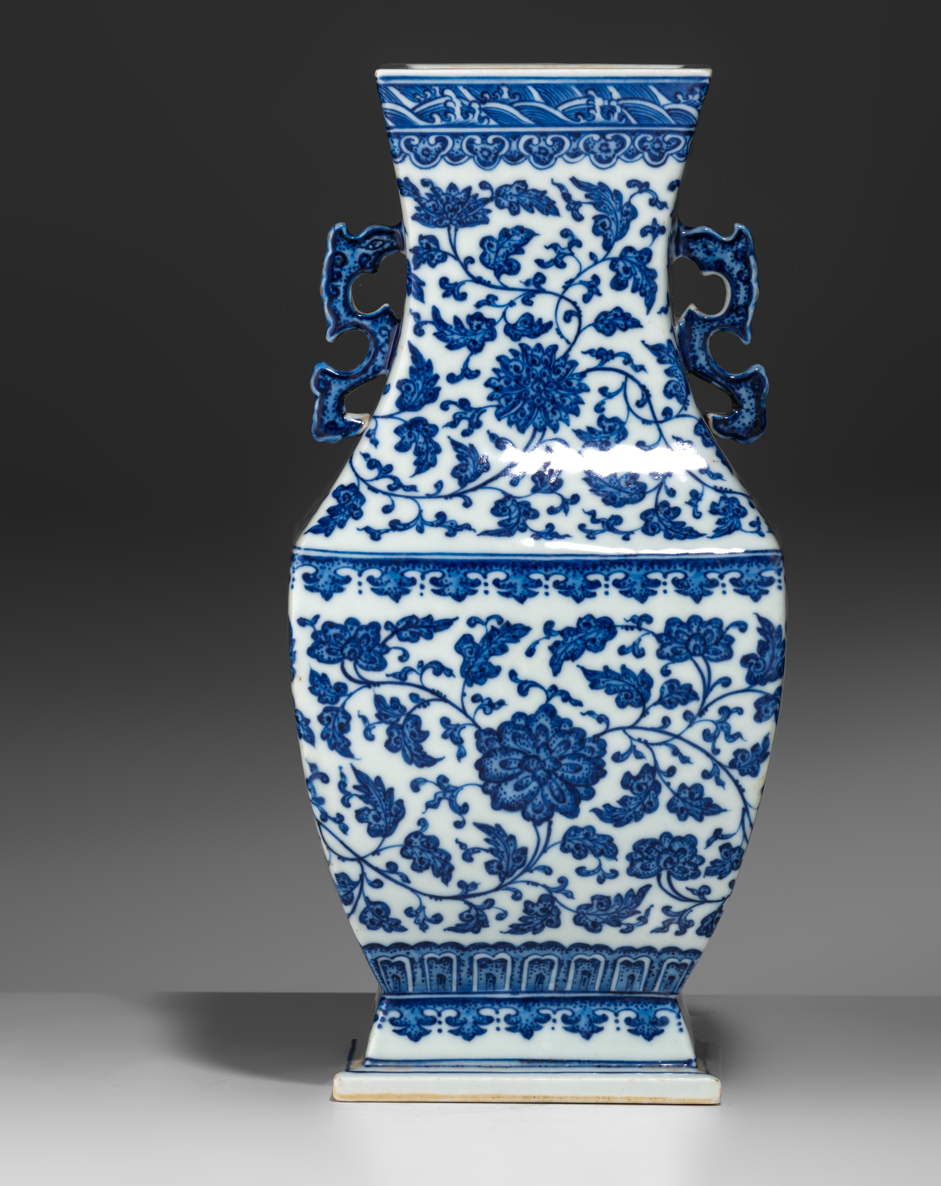 A Chinese blue and white 'Lotus scrolls' fanghu vase, paired with dragon handles, with a Qianlong ma - Image 3 of 9