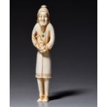 An ivory okimono of a Dutchman with a doll, signed, H 9,6 cm, 22 g (+)