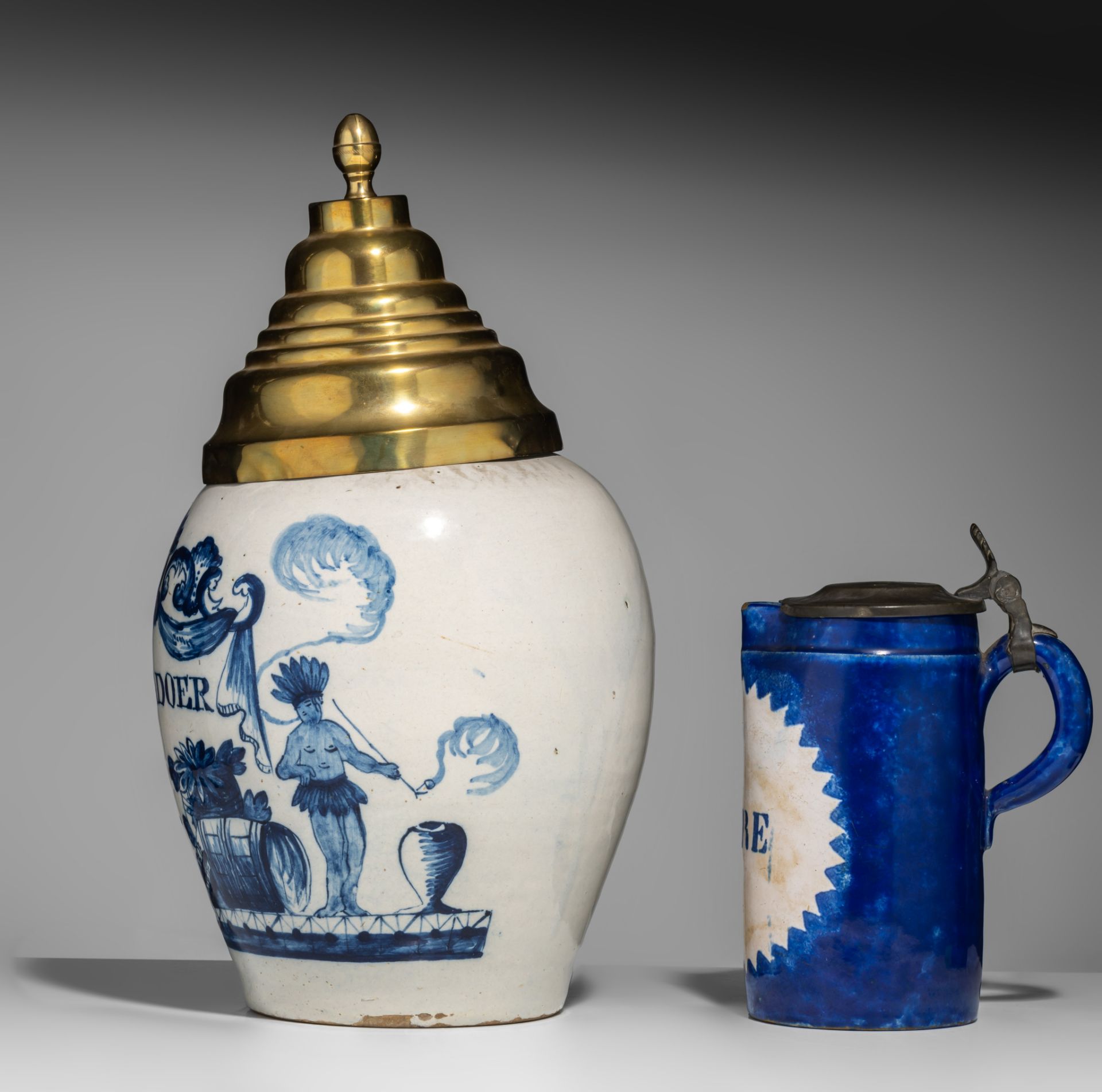 An 18thC Dutch Delft tobacco jar and an early 19thC Brussels one-litre jar, H 21,5 - 39 cm - Image 3 of 8