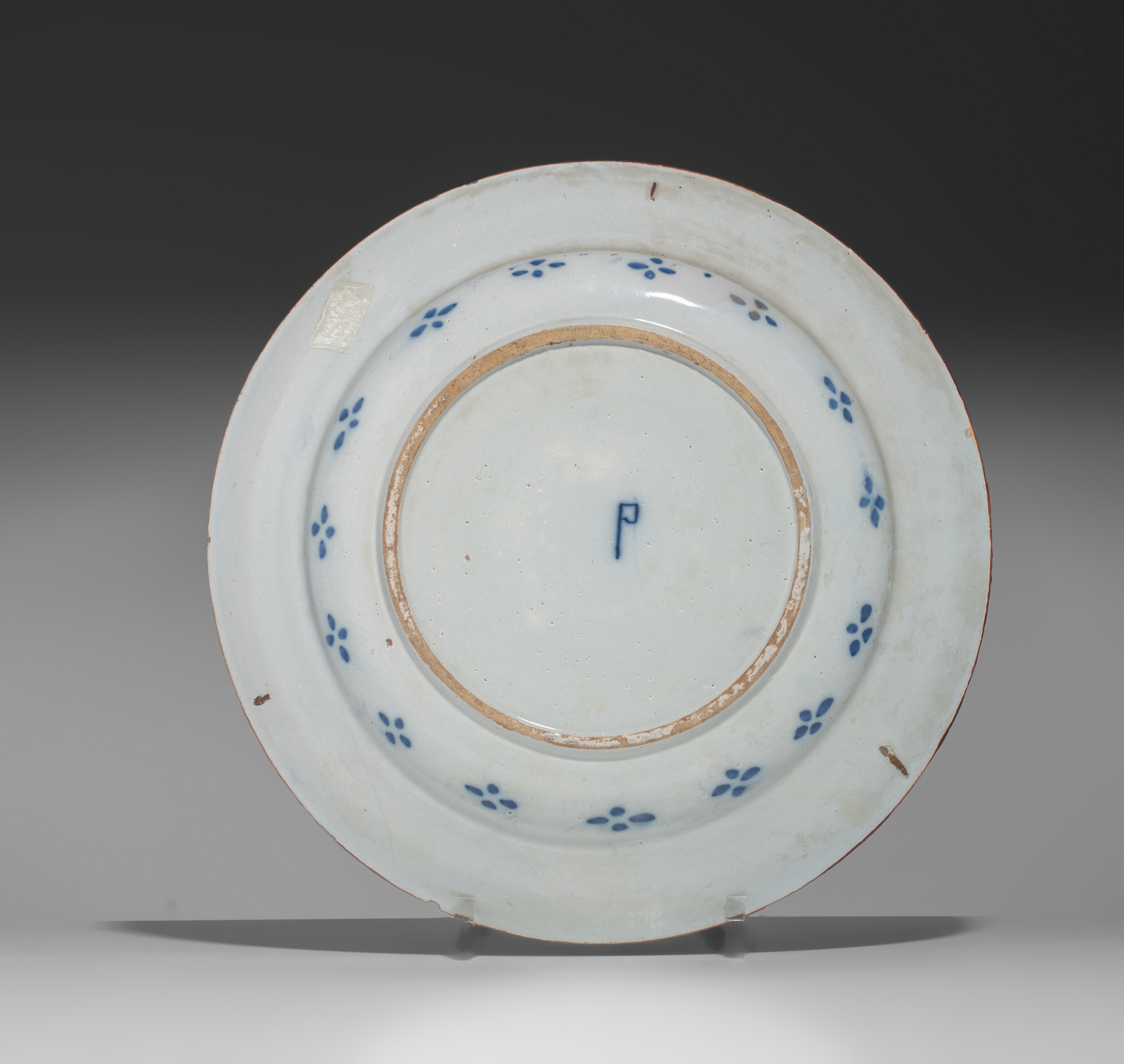 A various collection of thirteen 18thC Delft chargers and plates, ø 22 - 34,5 cm - Image 13 of 17