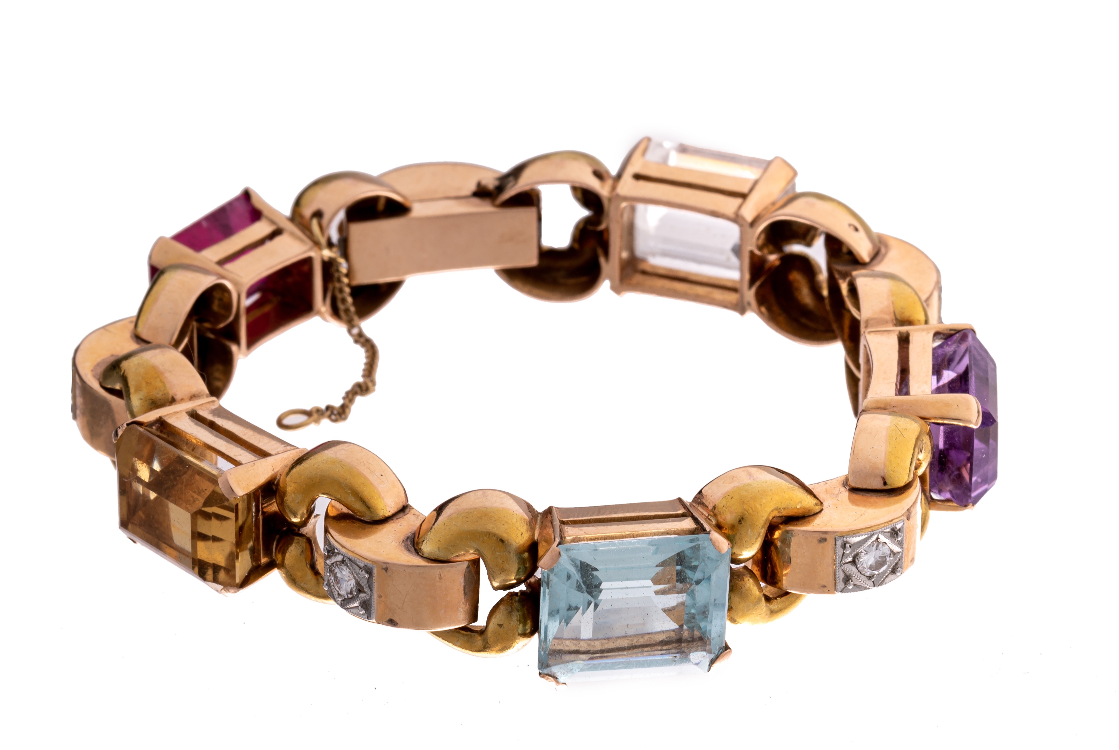 A bracelet in 18ct yellow gold, set with semi-precious stones and diamonds, 45,5 g